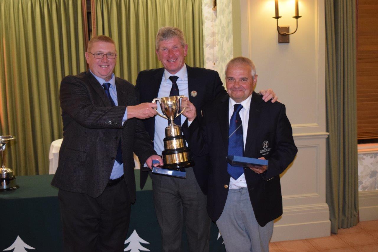 Mark Rimmer and Ian Kinsey collect the 2018 trophy from the Lancashire Union President at Formby