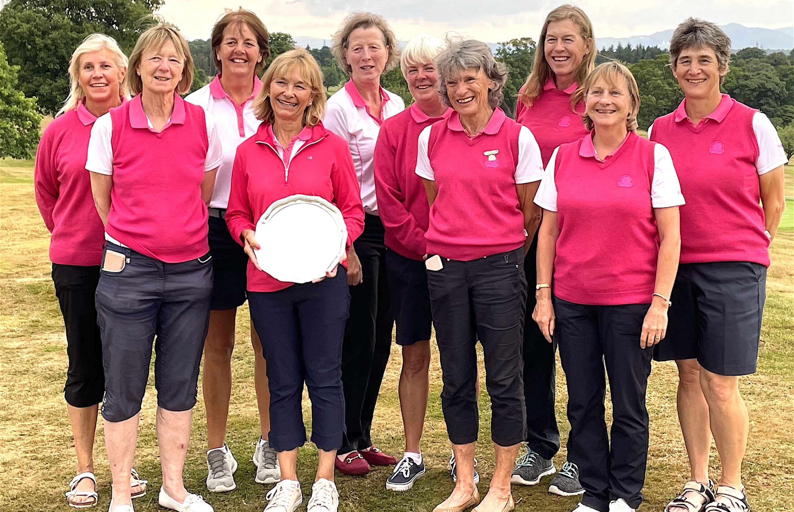 CHAMPIONS: The victorious South region team with captain Debbie Richards holding the trophy