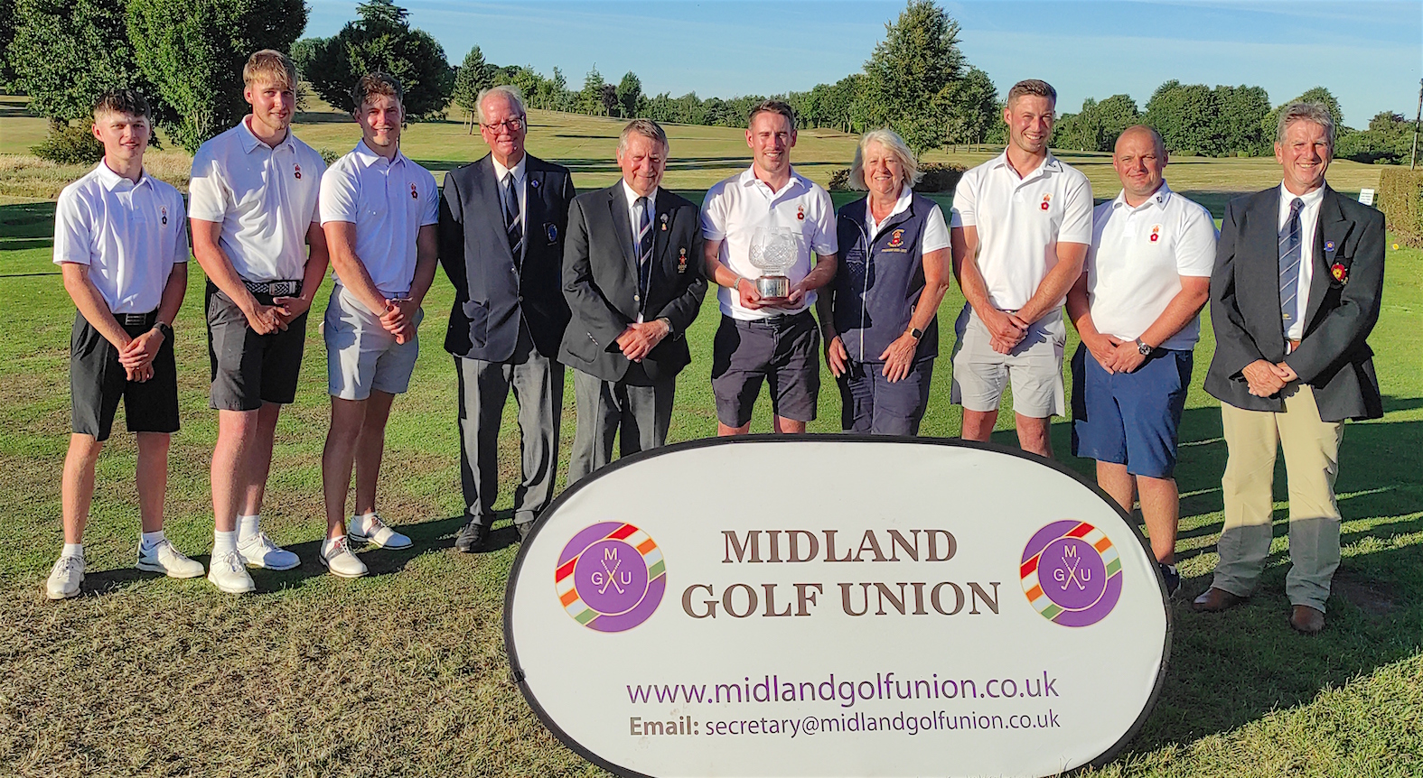The victorious Derbyshire team at Overstone Park with officials from Derbyshire and the Midland Golf Union
