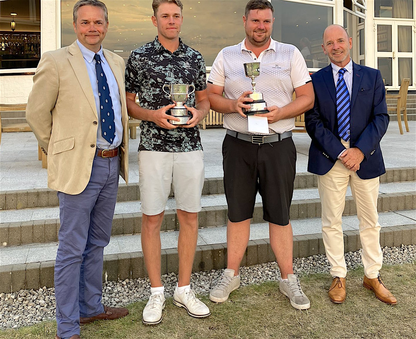 QUALITY WINNERS: Birkdale Goblet champion Jack Brooks (second right) with North West Links champion Callan Barrow and the captains of Royal Birkdale (left) and Hillside (right)