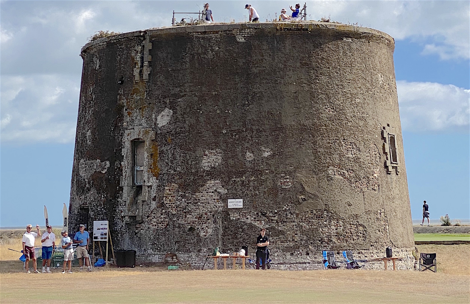 A Felixstowe Ferry member tees off off the Martello Tower. Pictures courtesy of the Anglia Picture Agency