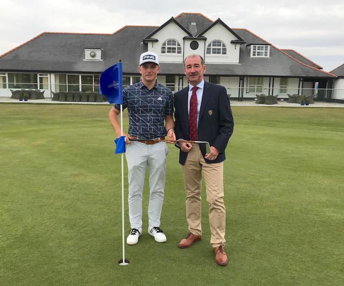 Tom Osborne is presented with The Duncan Putter by Southerndown Golf Club captain Julian Kelly