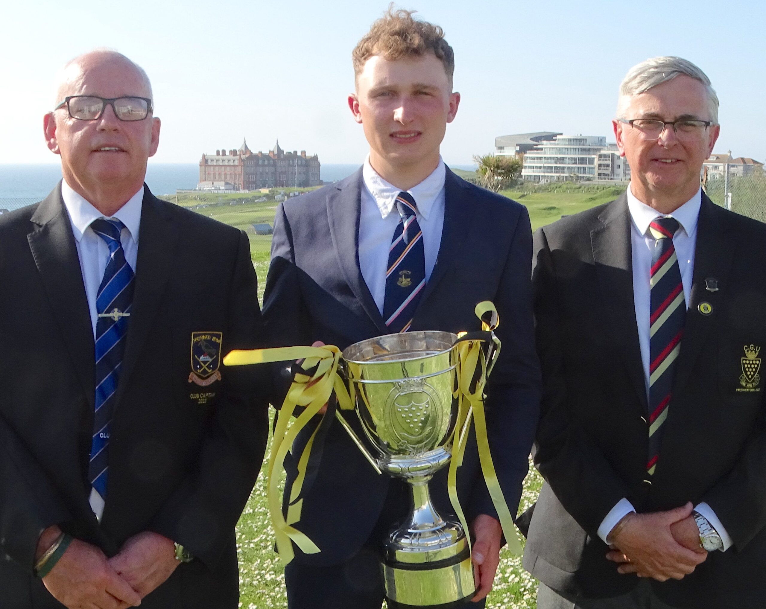 2023 Cornwall Men's Amateur champion Louis Archer with Newquay captain Dermot O'Callaghan (left) and Cornwall President Martin Edwards