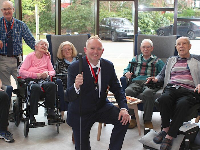 Prestwich Golf Club captain Paul Walsh, pictured with residents at Broughton House Veteran Care Village