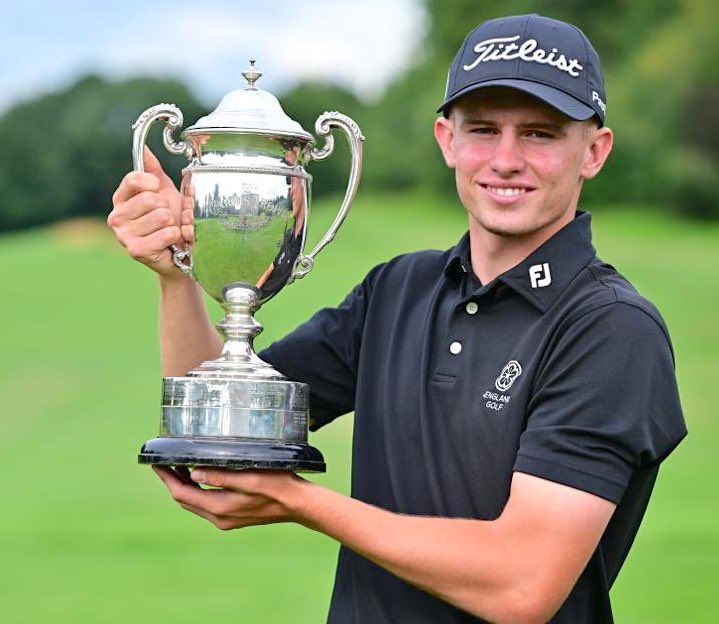Tyler Weaver holds the Carris Trophy after winning the 2023 event at Moor Park Golf Club